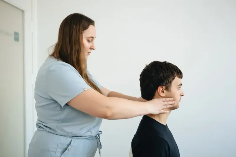 An allied health practitioner working with a patient