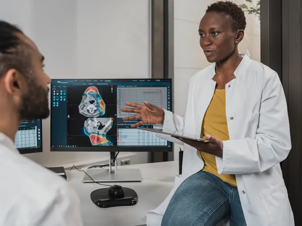 Healthcare professional discussing treatment plan with patient